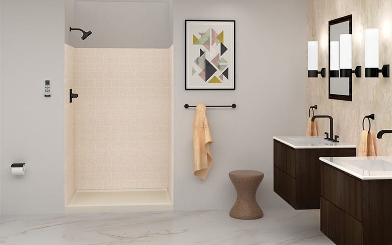 Modern bathroom featuring a walk-in shower, dual sinks, and stylish fixtures. A framed geometric art piece adds a decorative touch.